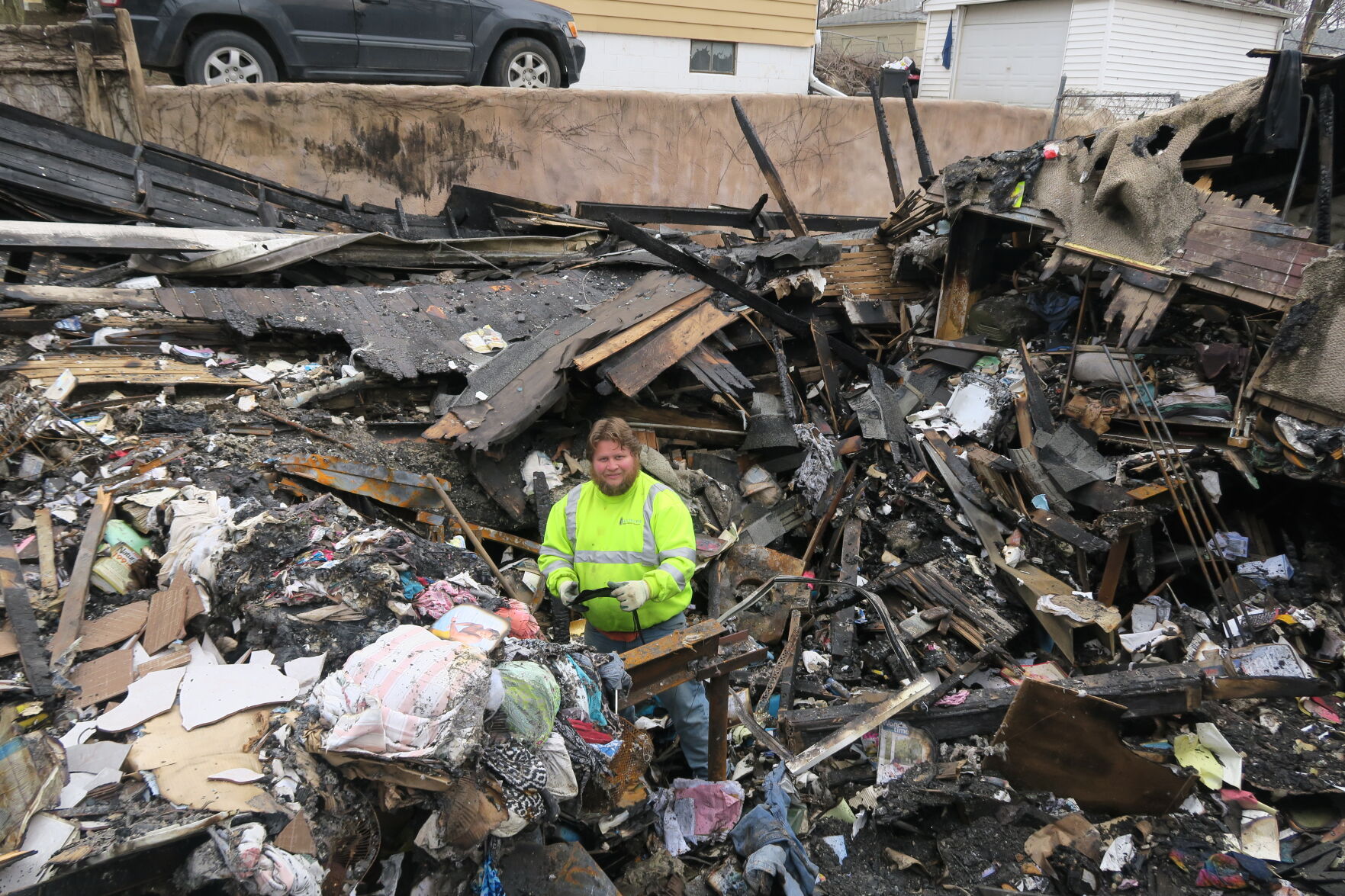 Son searches for mother's jewelry following fire set by her husband